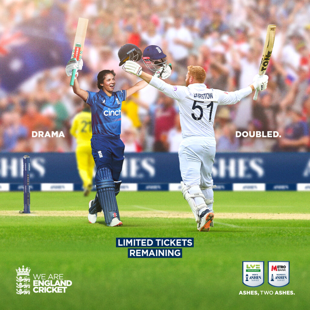 Sophia Dunkley and Jonny Bairstow walking towards each other celebrating on a cricket pitch, with an Australian player in the background, in front of a crowd holding England and Australian flags