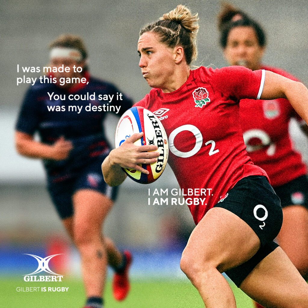 Claudia McDonald carrying the ball forward in a match scenario. A headline reads: “I was made to play this game, you could say it was my destiny. I am Gilbert. I am rugby.”