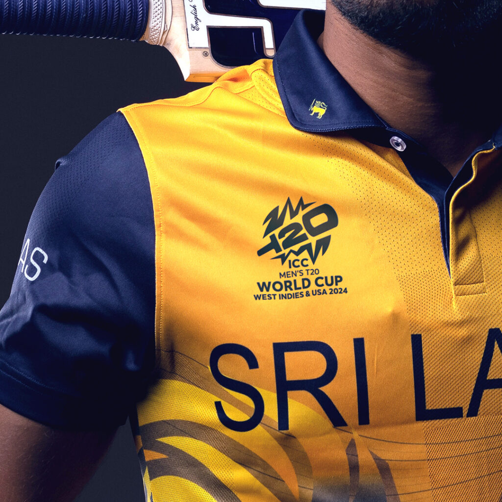ICC T20 world cup logo on a yellow shirt with navy collar and sleeves