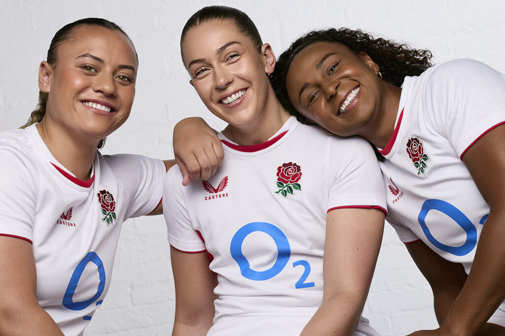 Three Red Roses players Maddie Feaunati, Holly Aitchison and Jade Shekells smiling