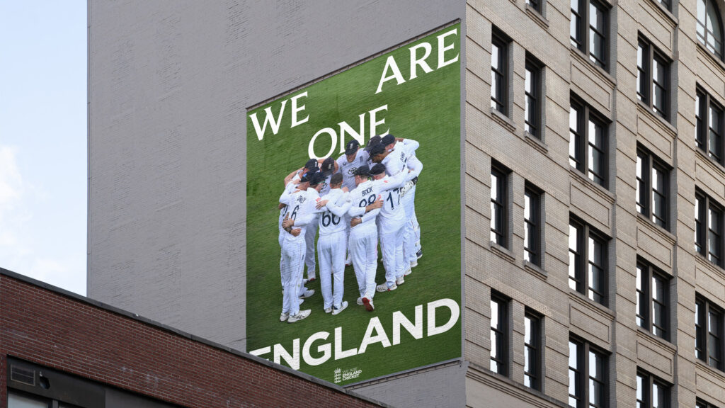 A billboard showing the rebrand on the side of a building