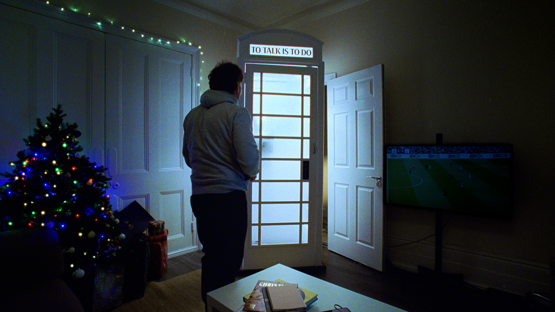 white lit up phone box